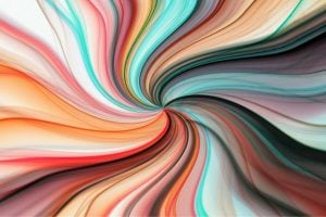 Abstract swirl of multicolored ribbons converging at the center, suggesting energy and motion.