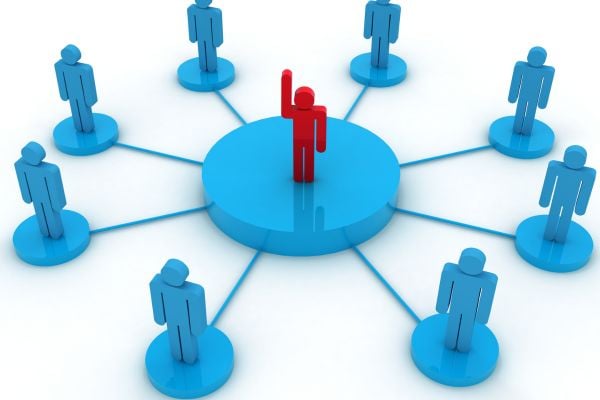 community 1 - fundsforNGOs Hub-and-spoke network: a red central figure connected to multiple blue figures around a blue hub.