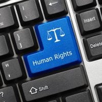 human rights - fundsforNGOs Blue keyboard key labeled 'Human Rights' with scales icon, among other keys. Represents advocacy or rights-related action on a keyboard.