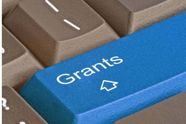 Marine Conservation 14 - fundsforNGOs Blue keyboard key labeled 'Grants' with a cursor icon, symbolizing grant applications