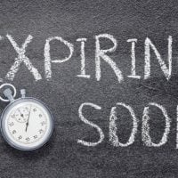education and sports for children - fundsforNGOs Chalkboard with 'EXPIRING SOON' written in chalk beside a stopwatch.