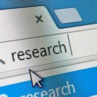 research 1 - fundsforNGOs Web browser search field with a magnifying glass icon and the word 'research', with the cursor pointing at the field.
